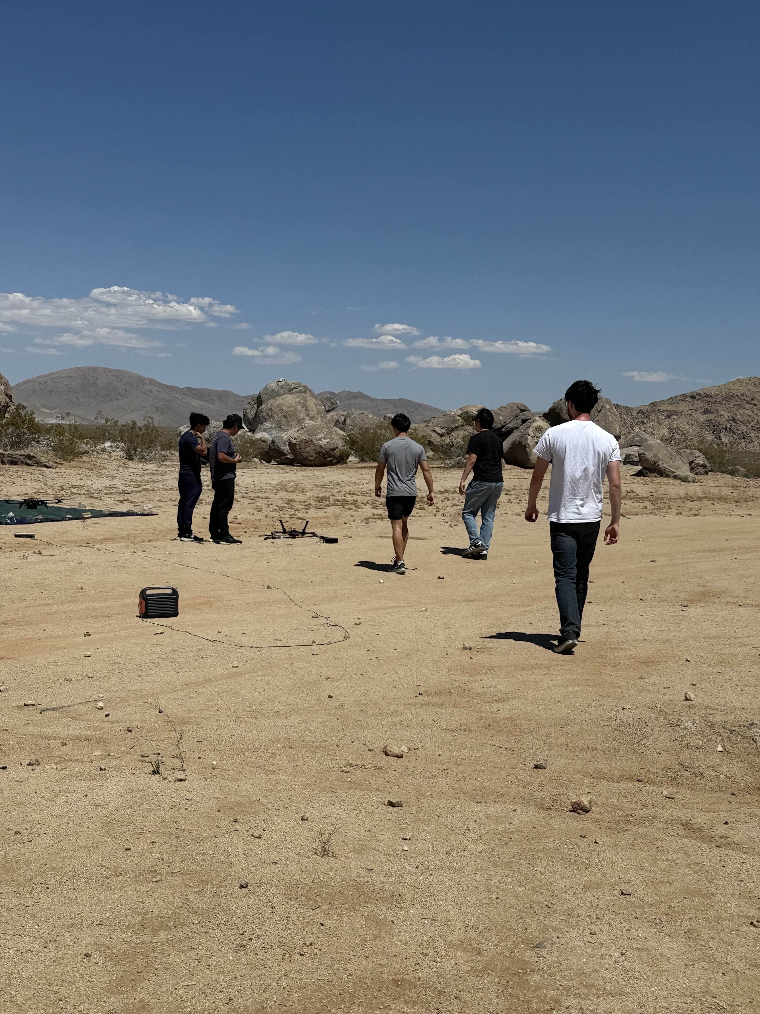 Expansive desert landscape with rolling sand dunes and distant mountains, symbolizing the vast frontier of robotic exploration and our journey into uncharted technological territory